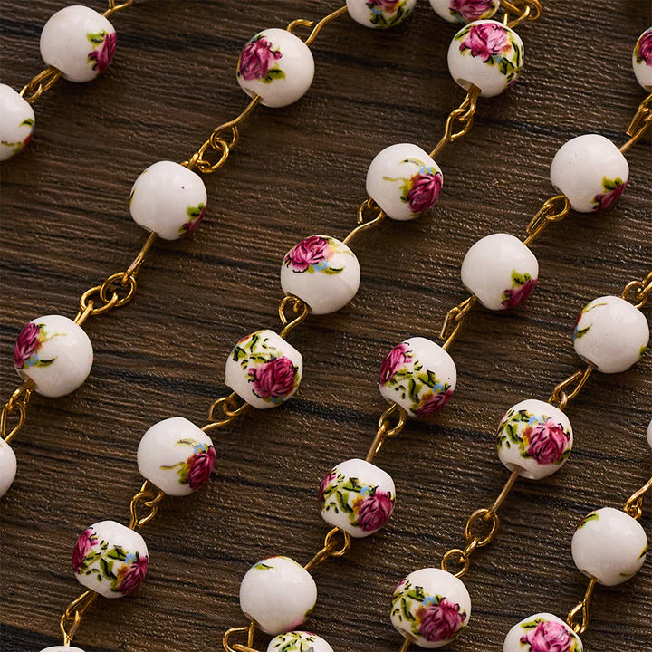 SolaceBeads Handcrafted Floral Ceramic Rosary: Where Purple Petals Meet Grace - image 4