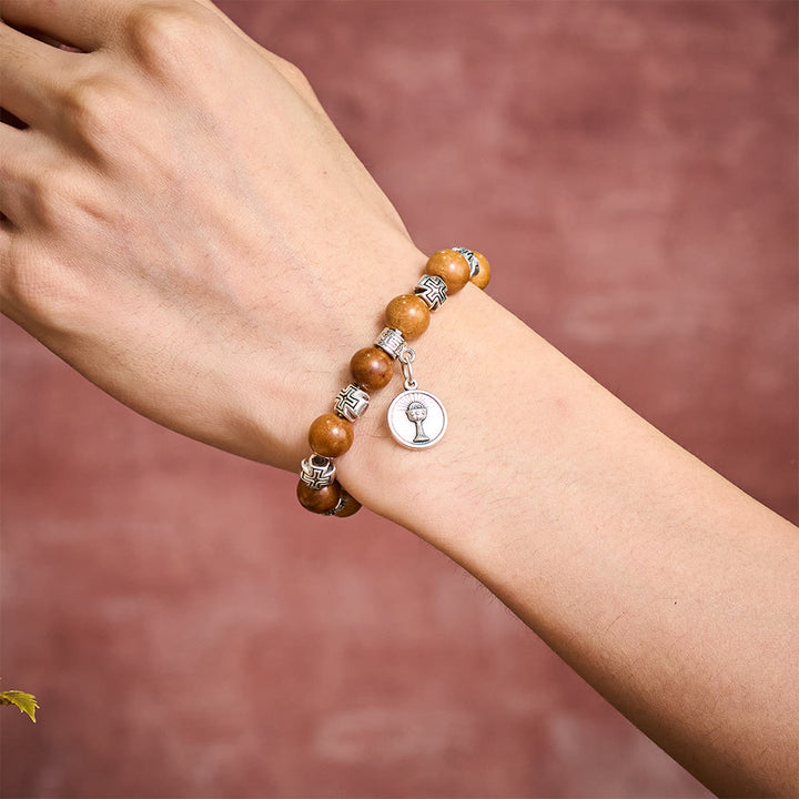 SolaceBeads Peach Wood Bracelet: Blessing of the Wood - Cross Spacers &amp; Chalice and Host medal - image 1