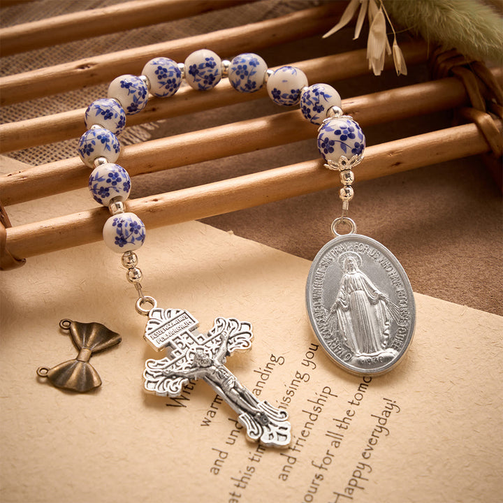 SolaceBeads Blue &amp; White Floral Ceramic Pocket Rosary With Cross &amp; Miraculous Medal: Timeless Devotion - Blue &amp; White Floral - image 0