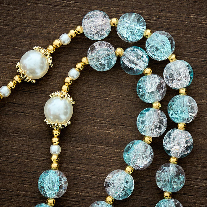 Solacebeads Pink‑blue Crackle Beads With golden Crucifix: The Shimmering Beauty And Maria Devotion - image 2