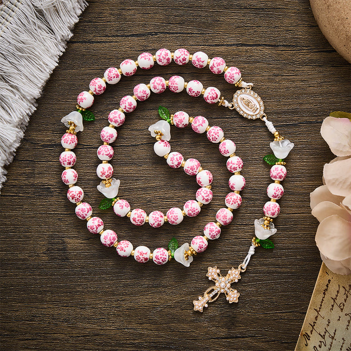 Solacebeads Pink Floral Ceramic Rosary With White Lily &amp; Pearl Cross: The Pure Devotion Of Guadalupe - Pink - image 0