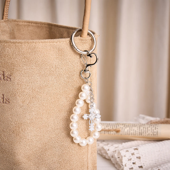 Solacebeads Pearl Bead Keychain With Pearl‑Set Silver Cross &amp; Heart Clasp: Purity in Luster - image 1