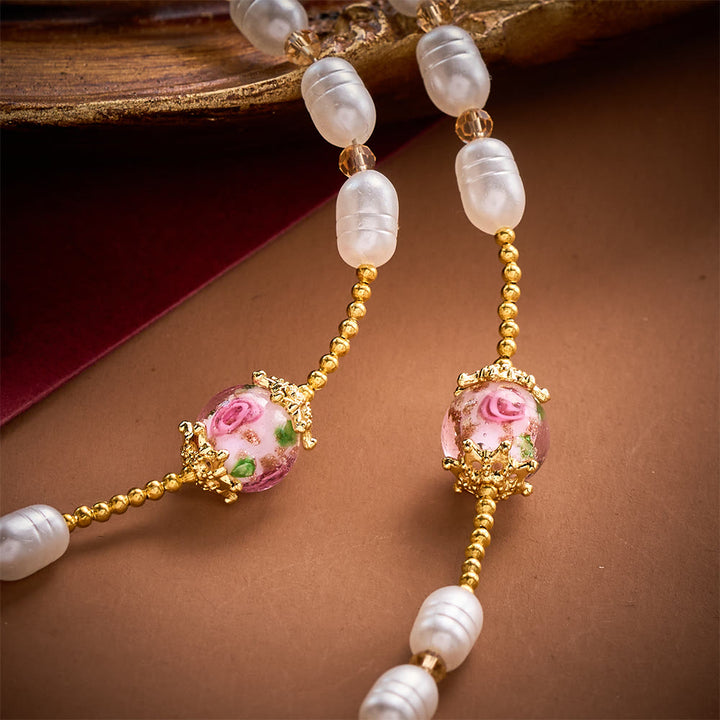 Solacebeads Lustrous Oval Pearl &amp; Rose Lampwork Artistic Rosary &amp; Gold Cross: Devotional Elegance - image 1