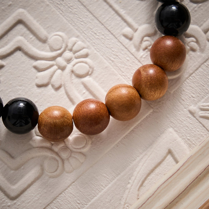 SolaceBeads Peach Wood &amp; Onyx Bracelet: Cross Accent for Steadfast Belief - image 3
