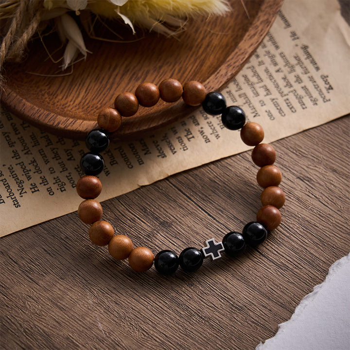 SolaceBeads Peach Wood &amp; Onyx Bracelet: Cross Accent for Steadfast Belief - Peach Wood &amp; Black Obsidian - image 0
