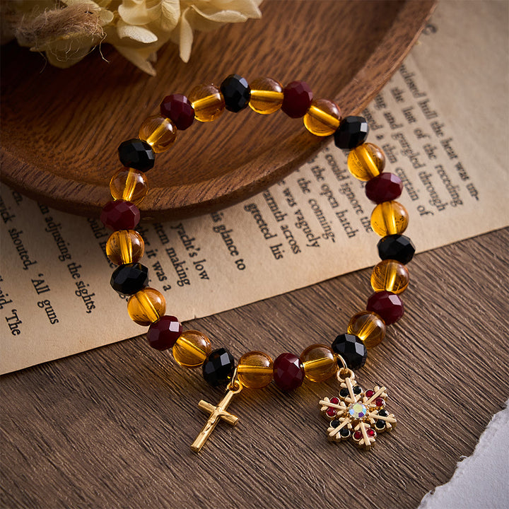 SolaceBeads Amber Glass &amp; Crystal Snowflake Crucifix Bracelet: Warm Light, Heavenly Peace - Amber &amp; Black &amp; Red - image 0